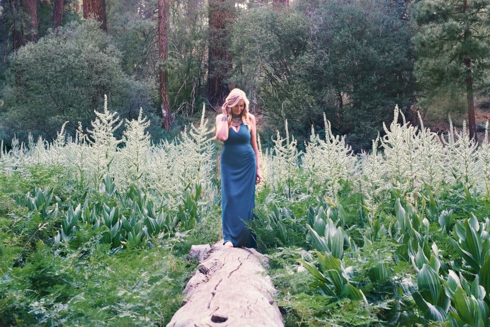 Elayne Le Monde walking in the forest